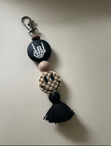 Rock on/ Checker Smiley Tassel