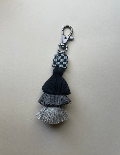 Grey checker arch tassel
