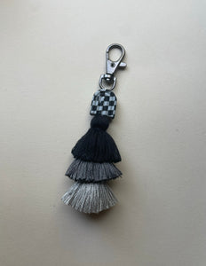 Grey checker arch tassel