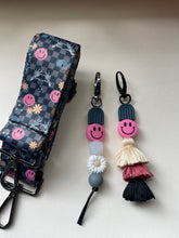 Load image into Gallery viewer, Grey Arch/ Pink Smiley Beaded Keychain