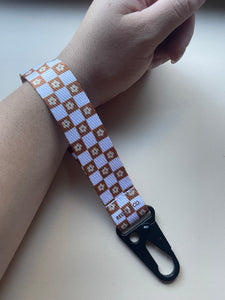 exclusive wrist keychain. daisy checker print