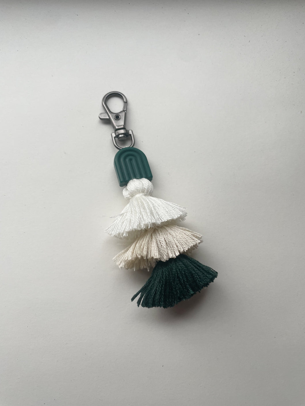 Forest green arch tassel