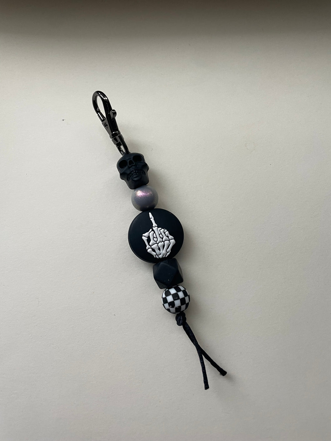 Skull/ silver / middle finger