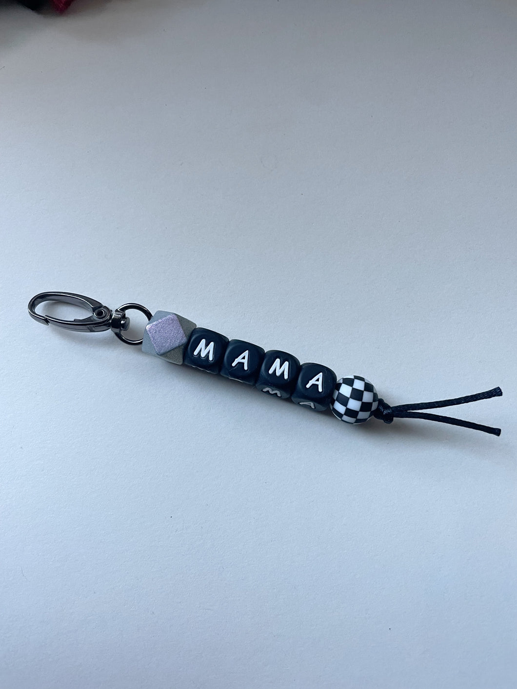 Silver/ checker Mama keychain